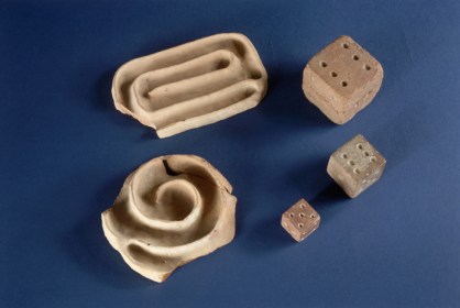 ca. 1971-1996, National Museum of New Delhi, New Delhi, India --- Indus Maze Games and Dice --- Image by © Angelo Hornak/CORBIS